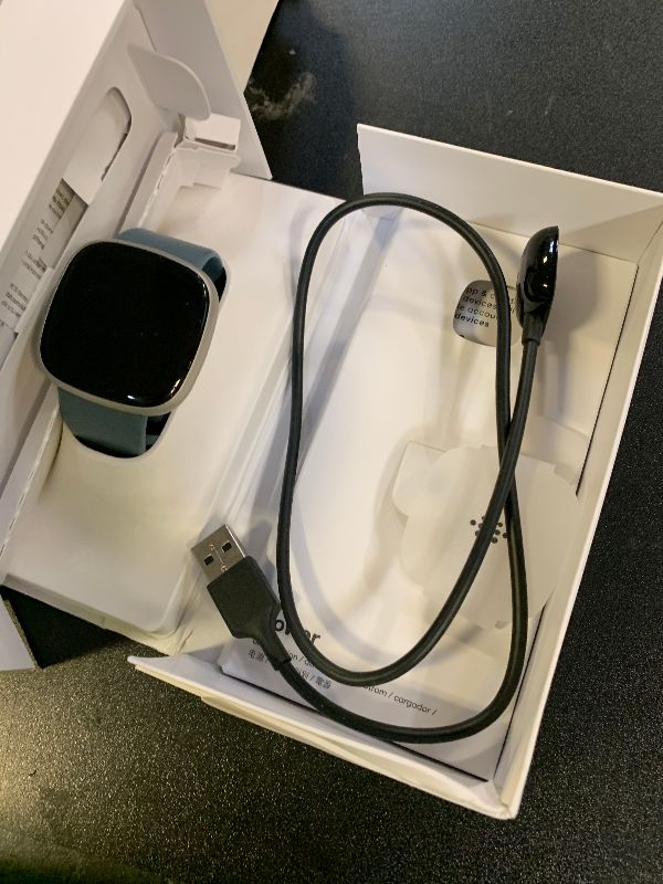 Photo 1 of Fitbit Versa 4 Fitness Smartwatch with Daily Readiness, GPS, 24/7 Heart Rate, 40+ Exercise Modes, Sleep Tracking and more, Waterfall Blue/Platinum, One Size (S & L Bands Included)