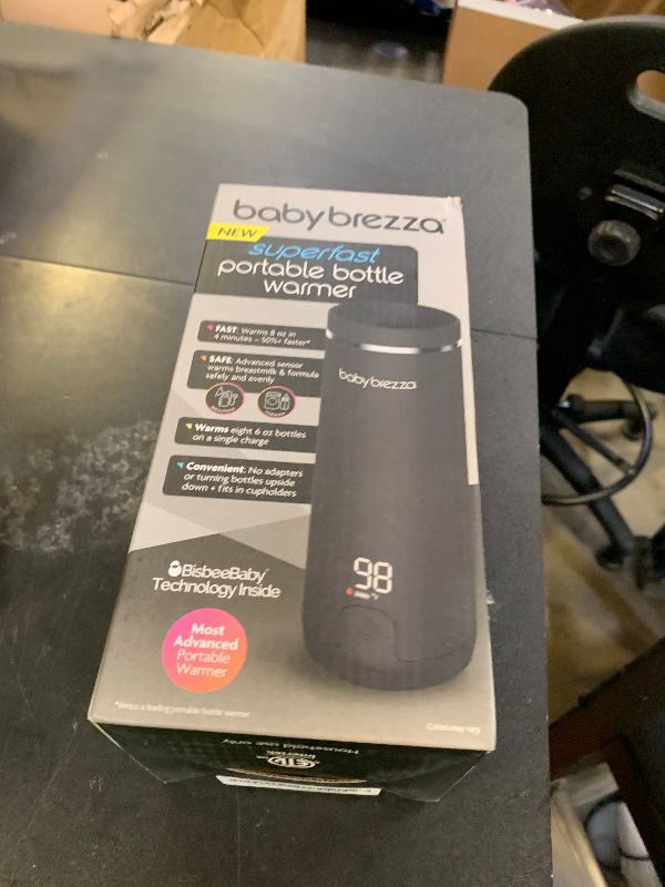 Photo 1 of Baby Brezza SuperFast Portable Baby Bottle Warmer – 67% Faster - Travel Breastmilk Warmer and Formula Warmer - Safe, Even Heating - Up to 9oz - No Adapters, Black