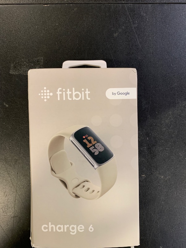 Photo 1 of Fitbit Charge 6 Fitness Tracker with Google apps, Heart Rate on Exercise Equipment, 6-Months Premium Membership Included, GPS, Health Tools and More, Porcelain/Silver, One Size (S & L Bands Included)