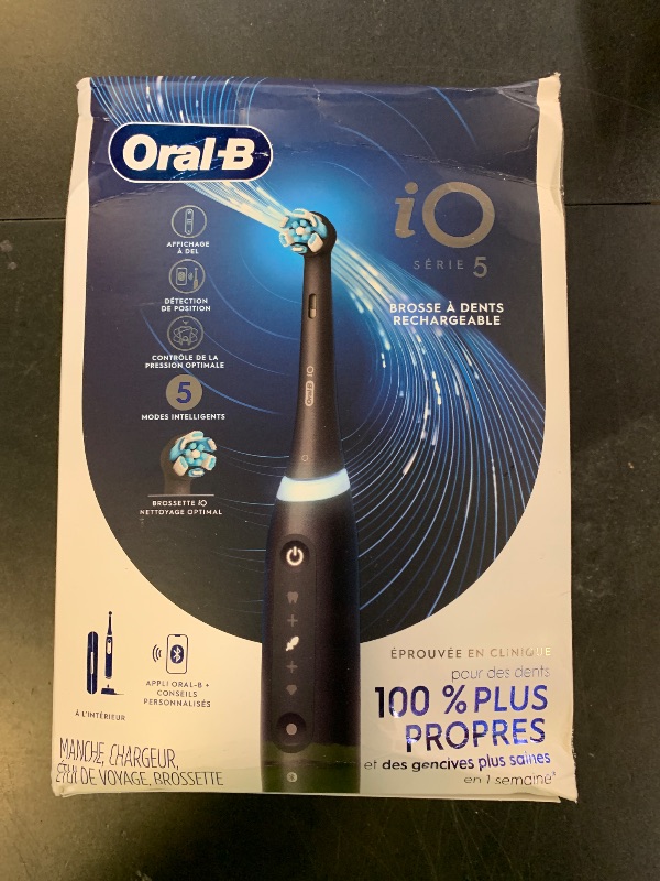 Photo 1 of Oral-B iO Series 5 Rechargeable Electric Toothbrush with Visible Pressure Sensor to Protect Gums, 2 Minute Timer, 5 Cleaning Settings, 1 Replacement Toothbrush Heads, and Travel Case, Black