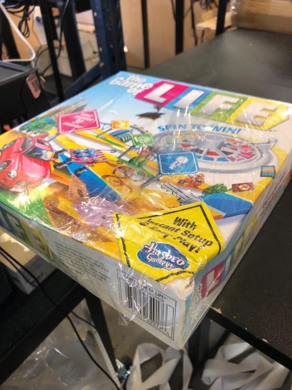 Photo 1 of Hasbro Gaming The Game of Life Board Game, Family Games for Kids Ages 8+, Includes 31 Careers, Family Board Games for 2-4 Players, (Amazon Exclusive)