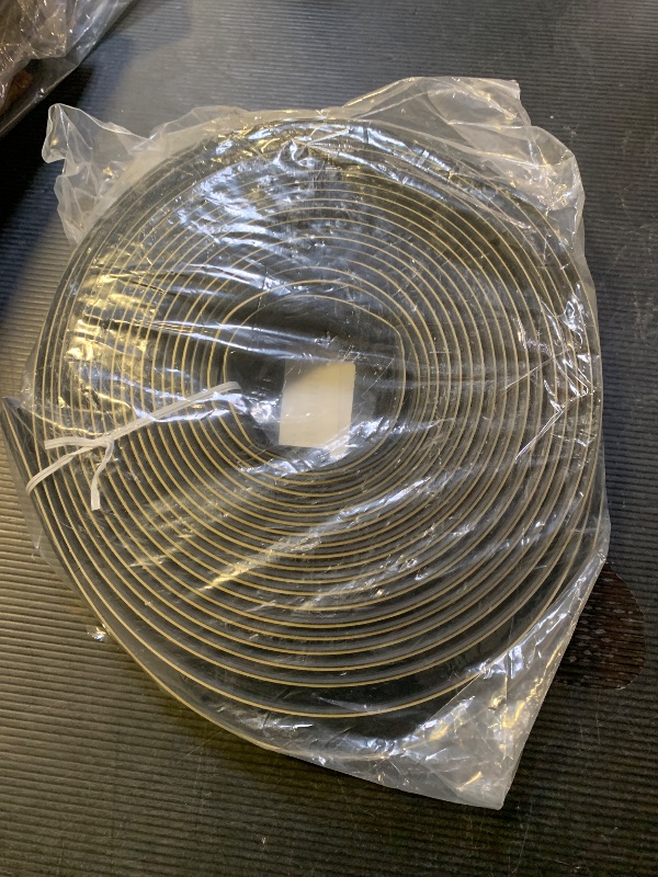 Photo 1 of M-D Building Products 91810 Soundproof Weather Stripping Door Seal, 40 feet Black Vinyl-Coated Foam Kerf/Channel, Easy to Install, Large Gap Coverage, Dust & Water Prevention