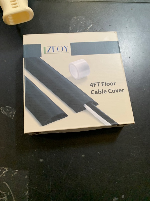 Photo 1 of Floor Cable Cover 3ft Brown, LZEOY Cord Covers for Wires on Floor, Low Profile Cord Hider Cable Management, Office/Carpet Compatible