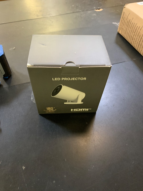Photo 1 of Mini Portable Projector 4K WiFi 6 BT 5.2 Upgraded Portable Projector Full HD Supported for Phone /PC /TV /HDMI /PS5 /Laptop Auto Keystone Home Theater 180° Rotation [Built-in App]