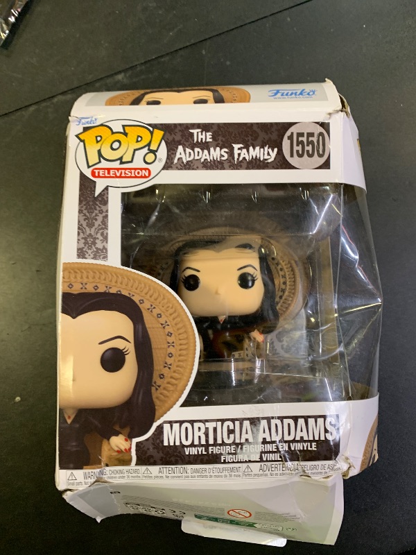 Photo 1 of Funko POP! Deluxe: The Addams Family – Morticia Addams in Chair - Addams Family Classic TV - Collectable Vinyl Figure - Gift Idea - Official Merchandise - for Kids & Adults - Horror Fans