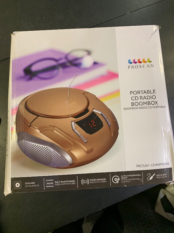 Photo 1 of SYLVANIA SRCD261-B-CHAMPAGNE Portable CD Player with AM/FM Radio (Champagne)