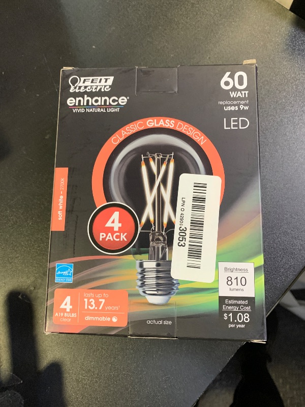 Photo 1 of Feit Electric LED Clear A19 Medium Base Light Bulb - 60W Equivalent - 15 Year Life - 810 Lumen - 2700K Soft White - Dimmable | 4-Pack