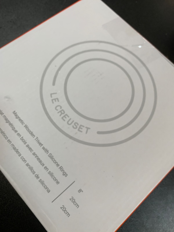 Photo 1 of *DAMAGED** Le Creuset Magnetic Wooden Trivet, Acacia Wood with Black Silicone Rings