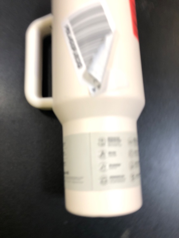 Photo 1 of STANLEY Quencher H2.0 Tumbler with Handle and Straw 40 oz | Flowstate 3-Position Lid | Cup Holder Compatible for Travel | Insulated Stainless Steel Cup | BPA-Free | Cream 2.0