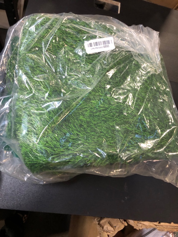 Photo 1 of Pad For Dogs 39.3 x 31.5 inches Strong Absorbency Soft Artificial Grass for Pets Potty Training, Easy to Clean Fake Grass for Dog Indoor Outdoor Use(1 Pack)