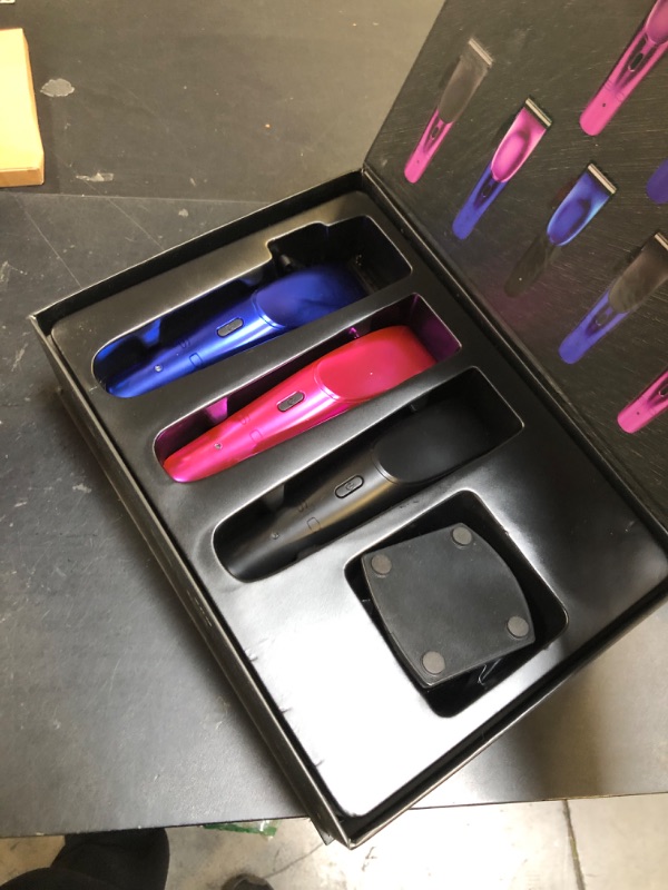 Photo 1 of StyleCraft Ergo Professional Microchipped Magnetic Clipper with 5 Guards, Charging Stand, and 3 Customizable Colored Lids (Black, Pink, Blue)