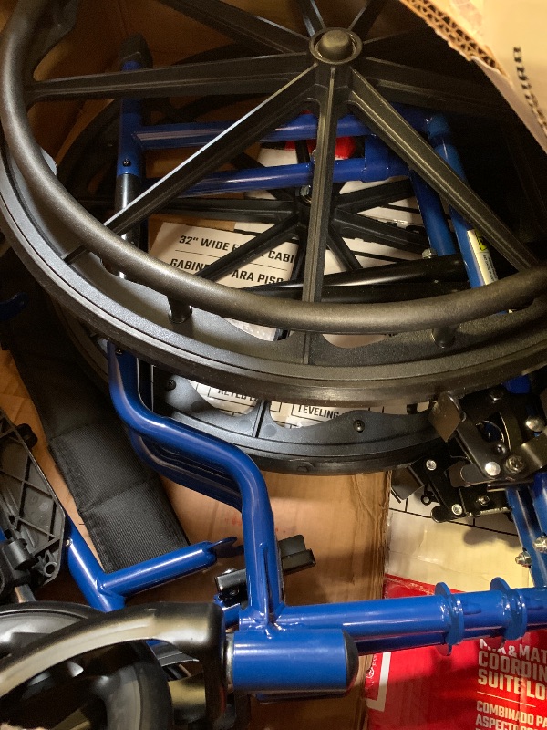 Photo 1 of Drive Medical Blue Streak Lightweight Wheelchair with Swing-Away Footrests and Flip-Back Arms, Portable Folding Wheelchair for Adults and Seniors, 18 Inch Seat
