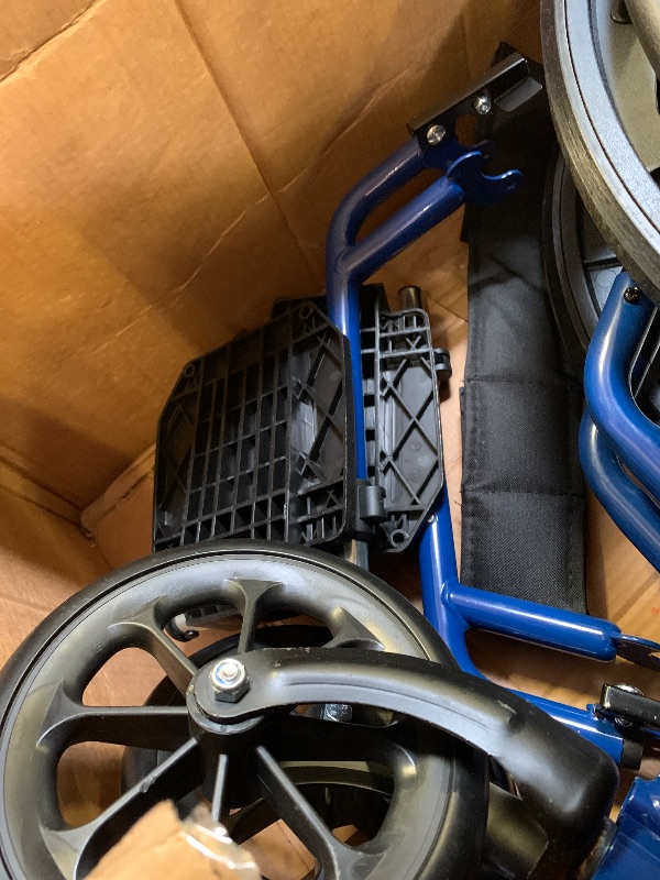 Photo 1 of Drive Medical Blue Streak Lightweight Wheelchair with Swing-Away Footrests and Flip-Back Arms, Portable Folding Wheelchair for Adults and Seniors, 18 Inch Seat
