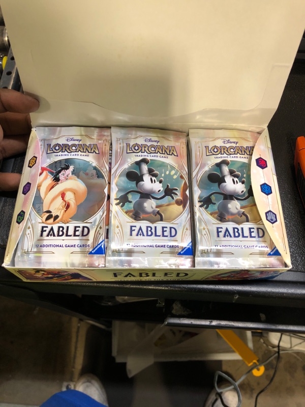 Photo 1 of **OPEN AND MISSING PACKS**Ravensburger Disney Lorcana TCG: Fabled Booster Pack Display | 24 Packs with 12 Trading Cards Each | Ideal for Collectors & Disney Fans | Suitable for Ages 8+ **OPEN AND MISSING PACKS**