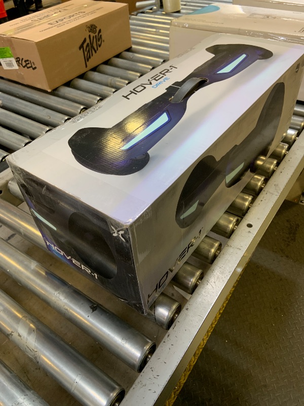 Photo 1 of Hover-1 Drive Electric Self Balancing Scooter with 7MPH Top Speed, 3 Mile Range, Long Lasting Lithium-Ion Battery, 6 HR Full Charge, Path Illuminating LED Lights and 6.5” Wheels