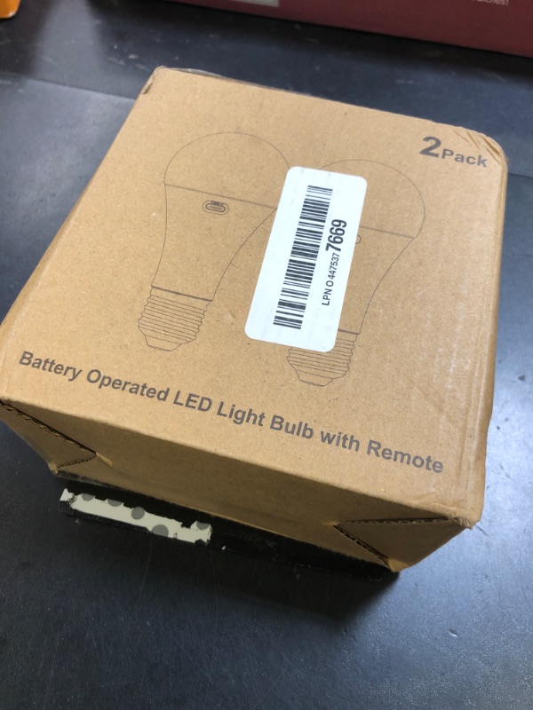 Photo 1 of Rechargeable Battery Operated A19 Light Bulb with Remote Control 2 Packs, Dimmable Detachable LED Bulb with 15 Colors Selectable & 3 Timer, Wireless Puck Light Bulb for Wall Sconce, Non-Hardwired