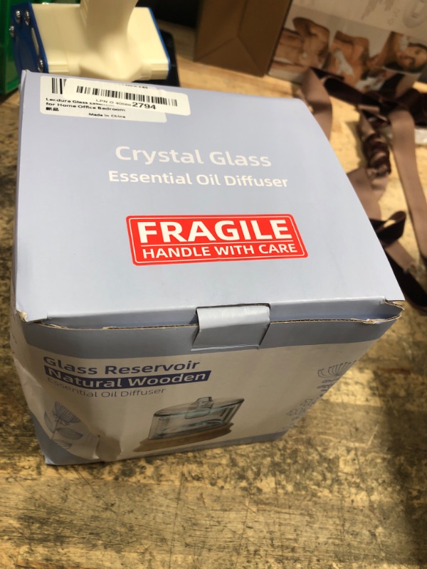 Photo 1 of *************missing power cord**********
Lecdura Glass Essential Oil Diffuser, 80ML Small Glass Reservoir Natural Wood Base Ultrasonic Cool Mist Aroma Diffusers with USB-Cord Auto-Off 7 Color Light for Home Office Bedroom