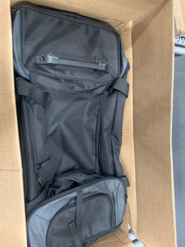 Photo 1 of ***DAMAGED - SEE NOTES/PICTURES*** Amazon Basics 35-inch Large Rolling Duffle Bag with Wheels and Handle, Travel Duffle Bag with Durable Ripstop Polyester Material, 2 Layers of Space, Multiple Interior and Exterior Pockets, Black