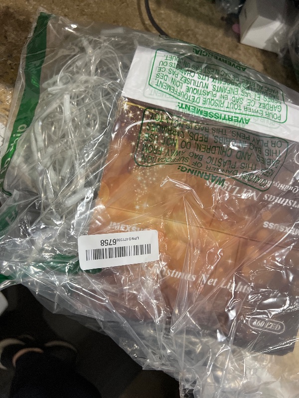 Photo 1 of ***MISSING POWER CONECTION PIECE*** JMEXSUSS Outdoor Net Lights Waterproof, 12ft x 5ft Plug in with 8 Modes Remoter, 360 LED Net Lights for for Bush Patio Christmas Tree Decor (Clear Wire, Warm White)