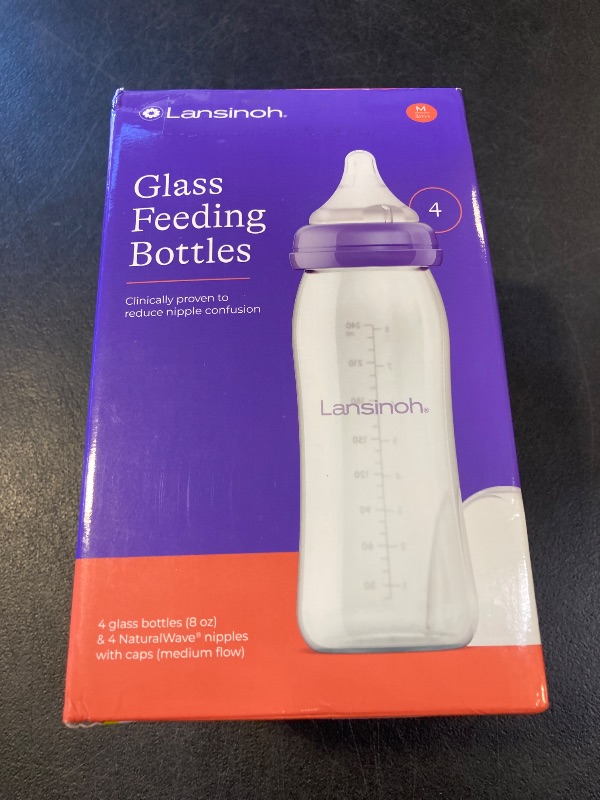 Photo 1 of Lansinoh Anti-Colic Glass Baby Bottles, 5 Ounces, 4 Count Bottles for Feeding, Baby Essentials, Includes 4 Slow Flow Nipples, Size S
