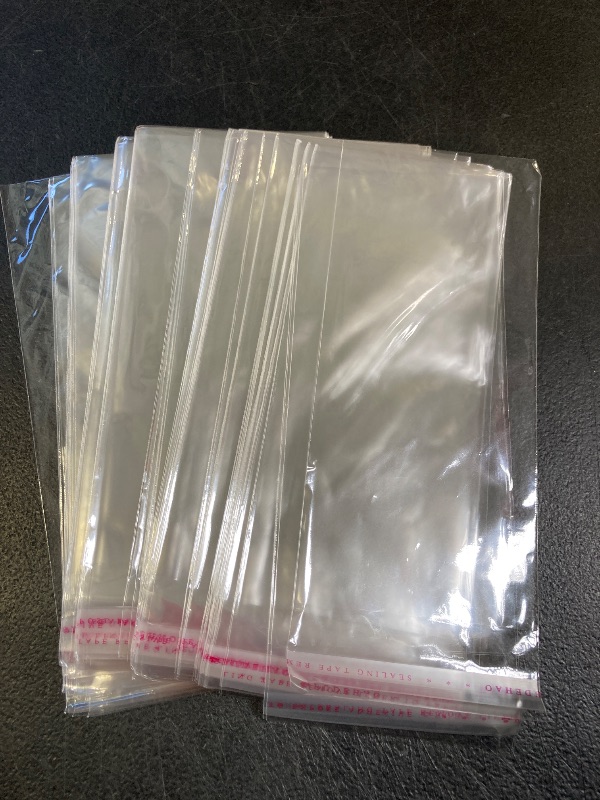 Photo 1 of FOMIYES 100pcs Opp Self-adhesive Bag Wrapping Bag Practical Package Bag Items Packaging Bag Multipurpose Packaging Bag Packing Bag Simple Package Bag Self-adhesive Packaging Bag
