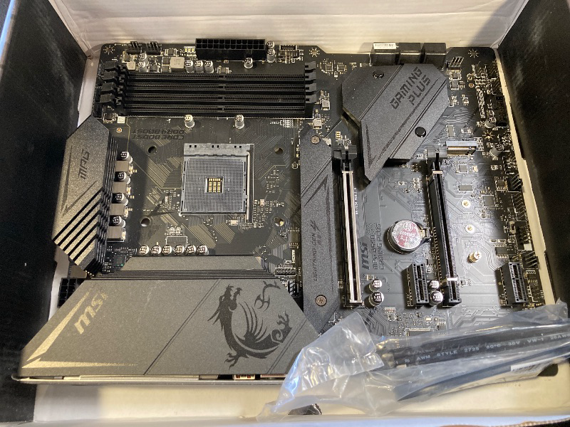 Photo 1 of MSI MPG B550 GAMING PLUS Gaming Motherboard (AMD AM4, DDR4, PCIe 4.0, SATA 6Gb/s, M.2, USB 3.2 Gen 2, HDMI/DP, ATX)
