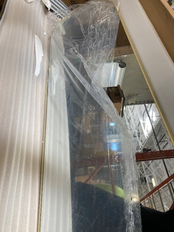 Photo 1 of  JONATHAN Y MIR206C Adrian 16 in. W x 59 in. H Large Arched Metal Framed Floor Full-Length Mirror, Free-Standing or Leaning for Bedroom, Dressing, Living Room, Gold 