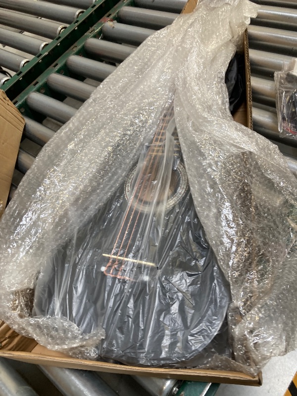 Photo 1 of  30" Black Beginner Acoustic Guitar Starter Package Student/Kids Guitar with Gig Bag,Strap,2 Picks,Extra Strings, Electronic Tuner. 