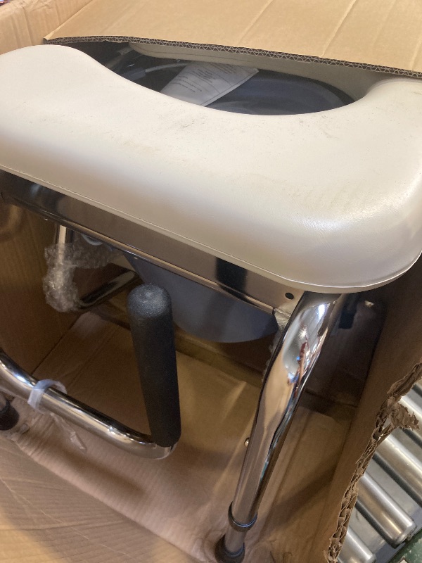 Photo 1 of Medline Drop Arm Commode with Padded Seat and Backrest, Durable Toilet Chair for Adults and Seniors, Removable Pail, Splash Guard, Drop Down Arms for Easy Transfer, 350 lb. Weight Capacity, Tan