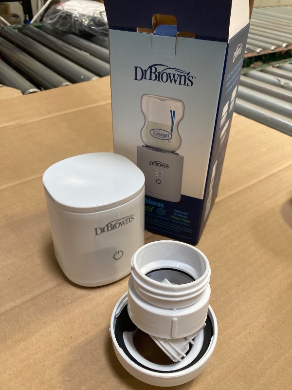 Photo 1 of Dr. Brown's Travel Baby Bottle Warmer, Quickly Warms Breast Milk and Water for Formula On-The-Go, Portable, Rechargeable, Cordless with 3 Bottle Adapters