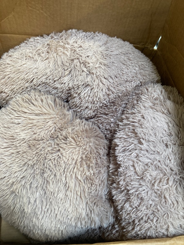 Photo 1 of WESTERN HOME WH Calming Dog & Cat Bed, Anti-Anxiety Donut Cuddler Warming Cozy Soft Round Bed, Fluffy Faux Fur Plush Cushion Bed for Small Medium Dogs and Cats (20"/24"/27"/30")