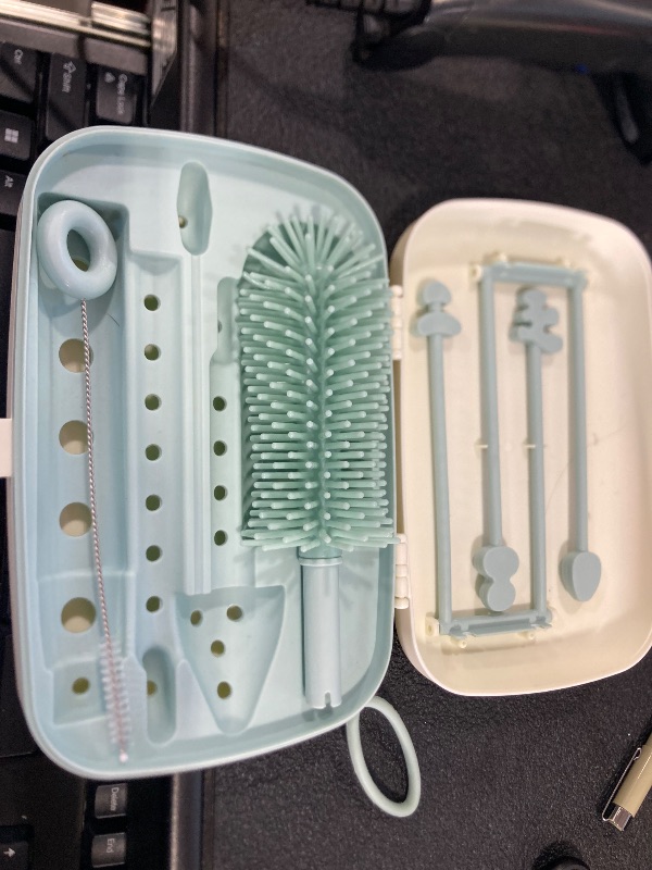 Photo 1 of Momcozy Bottle Brush Set - Baby Bottle Cleaner Kit with Silicone Brush, Nipple Brush, Straw Brush, Soap Dispenser, Drying Rack - 7 in 1 Bottle Cleaning Tool for Home and Travel, Green