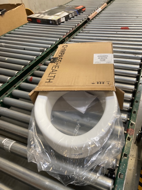 Photo 1 of Carex Toilet Seat Riser, Elongated Raised Toilet Seat Adds 3.5 inches to Toilet Height, for Assistance Bending or Sitting, 300 Pound Weight Capacity Toilet Riser