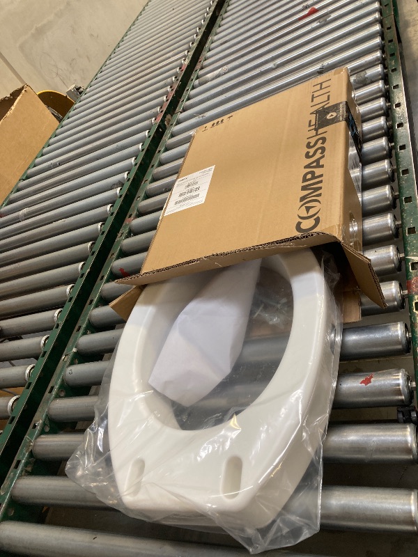 Photo 1 of Carex Toilet Seat Riser, Elongated Raised Toilet Seat Adds 3.5 inches to Toilet Height, for Assistance Bending or Sitting, 300 Pound Weight Capacity Toilet Riser