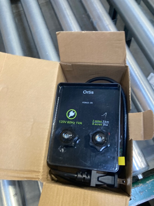 Photo 1 of Electric Fence Energizer, Ortis 2-Mile/ 8 Acres Electric Fence Controller for Dogs, Livestock, Squirrels, Used for Gardens, Chicken Coops, 0.1 Joule