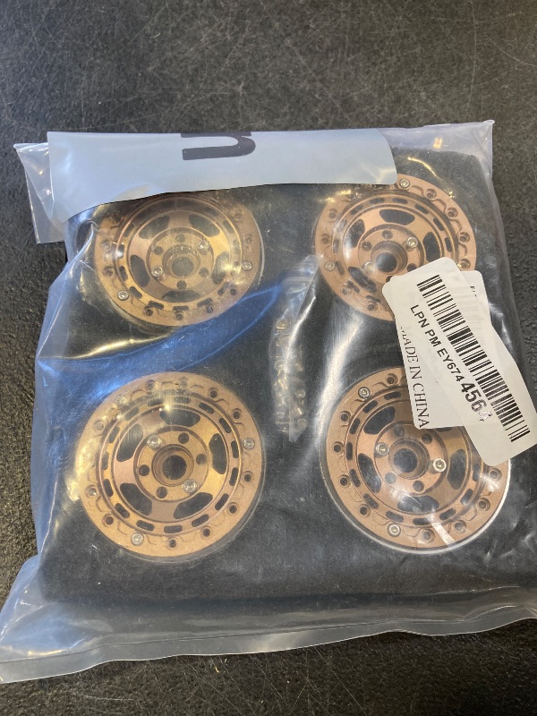 Photo 1 of 1.9" RC Beadlock Wheels Rims for 1/10 Scale RC Crawler (Set of 4) - Compatible with Traxxas TRX4, TRX6, Axial SCX10, SCX10 III, AXI03007, and D90 (Bronze)