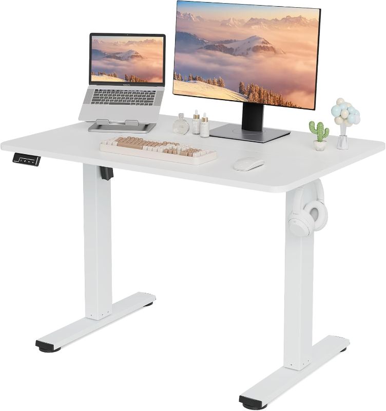 Photo 1 of Electric Standing Desk Adjustable Height, 40x24 Inches Sit Stand up Desktop for Home Office, Ergonomic Rising Computer Table with Memory Preset, White
