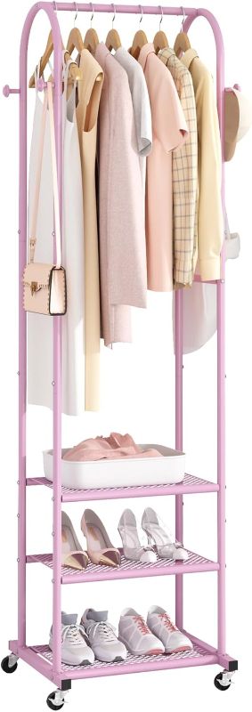 Photo 1 of Heavy Duty Clothing Rack with Wheels,Modern Garment Rack with 3 Metal Shelves, 71.8Inches Display Rack for Hanging Clothes, Hanging Rod for Small Space,Pink
