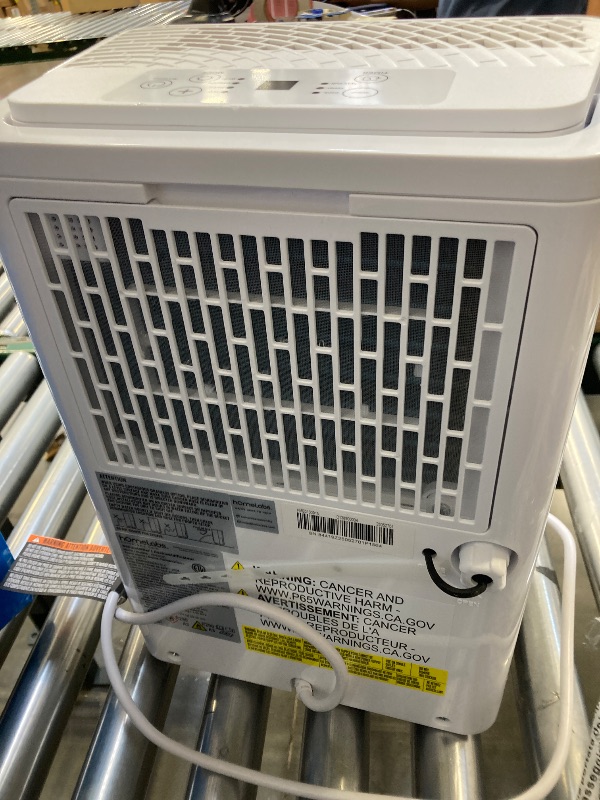Photo 1 of hOmeLabs 8 Pint Wi-Fi Dehumidifier for up to 1,800 Sq Ft Rooms (MAX 24 Pint at 95°F, 90% RH) – Ultra Quiet, Compact Design with Smart Controls and Drain Hose
