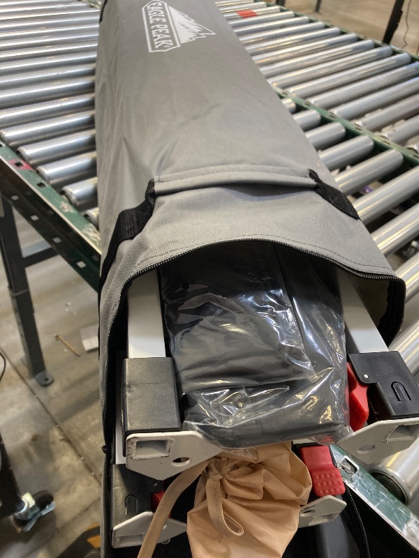 Photo 1 of EAGLE PEAK Pop Up Canopy Tent with Wheeled Carry Bag, 8 Stakes, 4 Ropes, 4 Weight Bags, Easy Set Up Tent Canopy, 10x10 ft, 100sqft of Shade, Green
