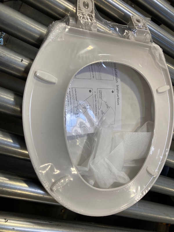 Photo 1 of  Toilet Seat and Lid
