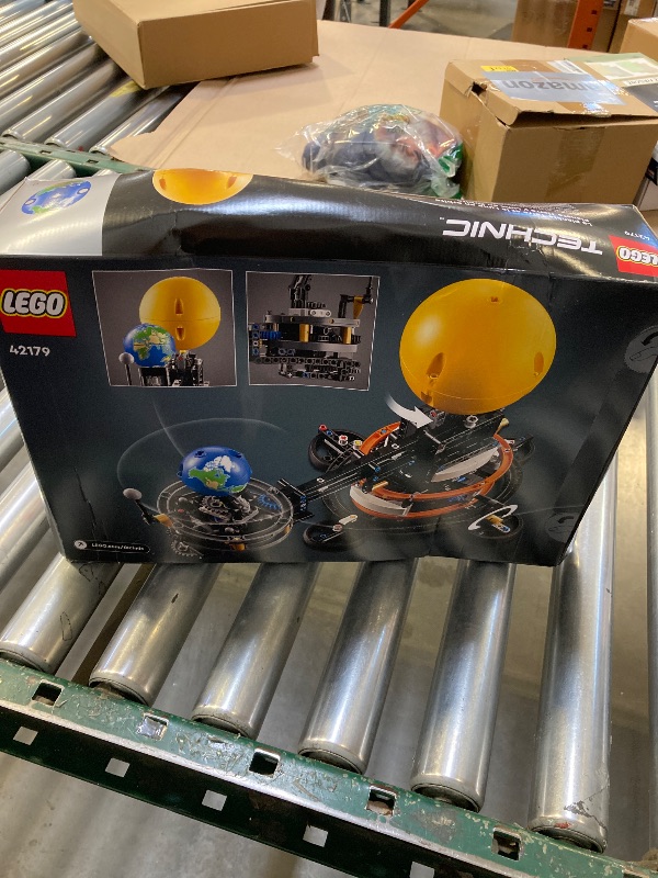 Photo 1 of LEGO Technic Planet Earth and Moon in Orbit Building Set, Outer Space Birthday Gift for 10 Year Olds, Solar System Space Toy for Imaginative, Independent Play, Space Room Décor for Boys & Girls, 42179