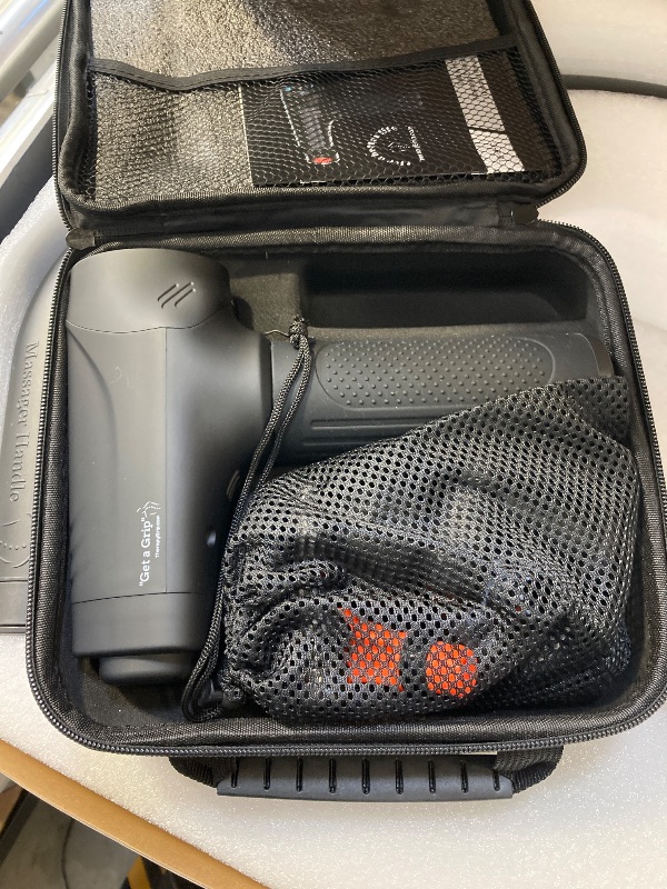 Photo 1 of TherapyGrip Professional Grade Massage Gun - Deep Tissue Back Massager with Heat and Cold Therapy Tip and Innovative Full-Body Extended Handle