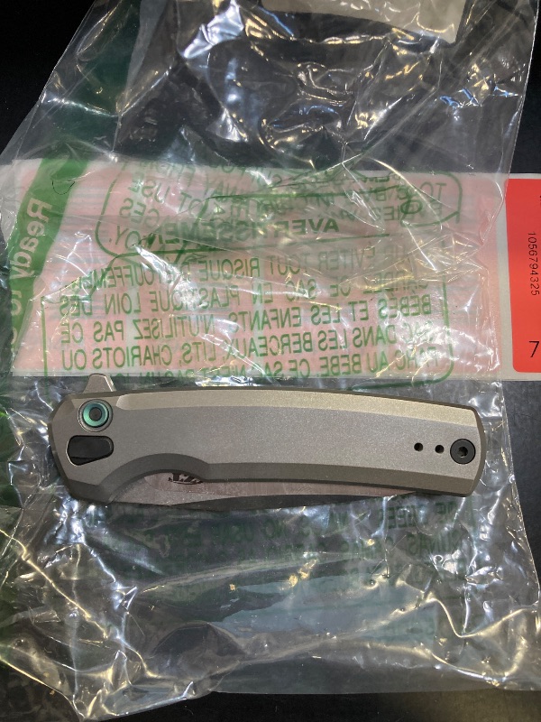 Photo 1 of Zero Tolerance 0044, Folding Pocket Knife, 3.2 inch CPM S45VN Steel Blade, Titanium Handle, Button Lock, Made in USA