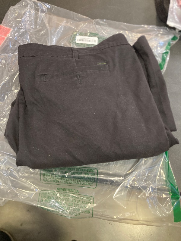 Photo 1 of IZOD Men's Big and Tall Performance Stretch Pleated Pant, Black, 46W X 32L