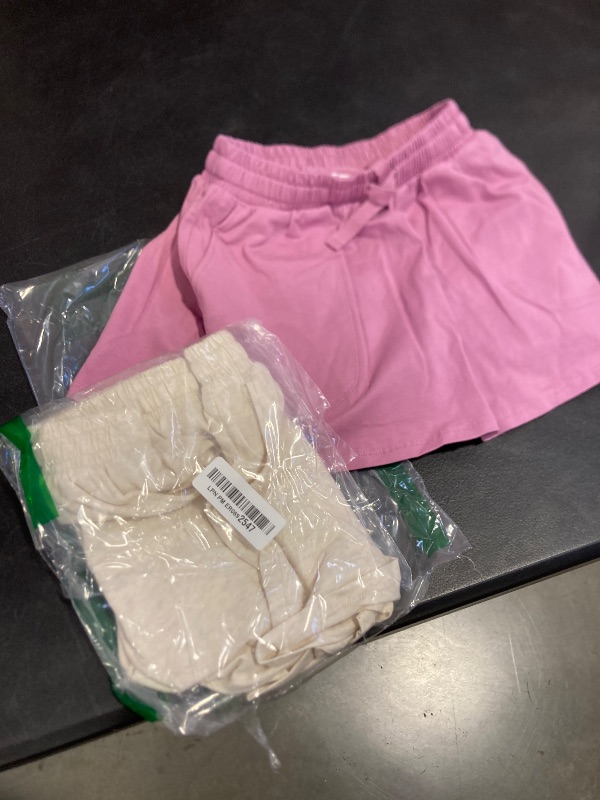 Photo 1 of Amazon Essentials Girls' Patch Pocket Skort, Pack of 2, Oatmeal Heather/Mauve, Small