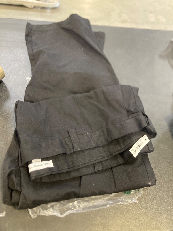 Photo 1 of Amazon Essentials Men's Classic-Fit Wrinkle-Resistant Flat-Front Chino Pant (Available in Big & Tall), Black, 56W x 32L