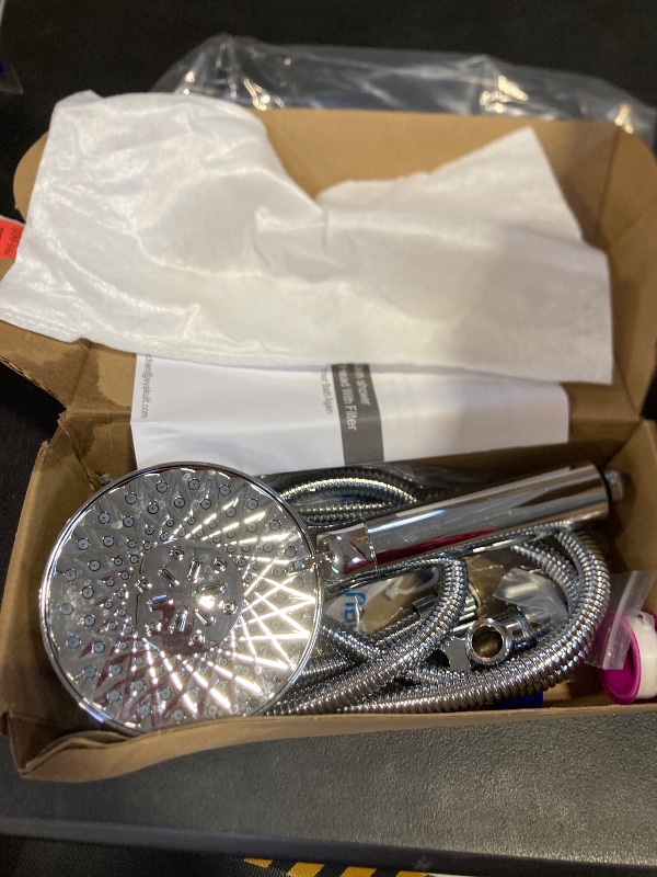 Photo 1 of Filtered Shower Head with Handheld, High Pressure 9 Spray Mode Chrome Showerhead with Filters,detachable shower head,Water Softener Filters Beads for Hard Water -Remove Chlorine some water in box