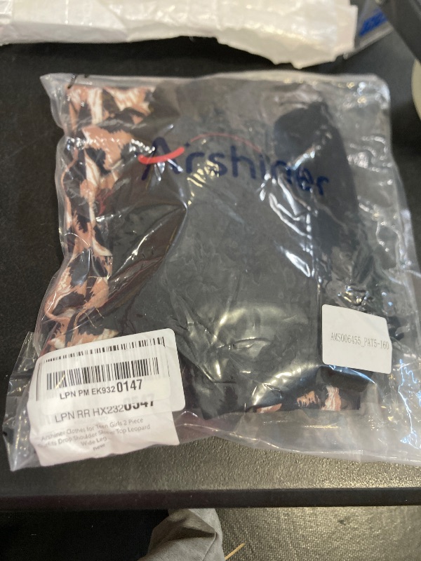 Photo 1 of Arshiner Clothes for Teen Girls 2 Piece Outfits Drop Shoulder Sleeve Top Leopard Wide Leg Pants Sets with Pockets