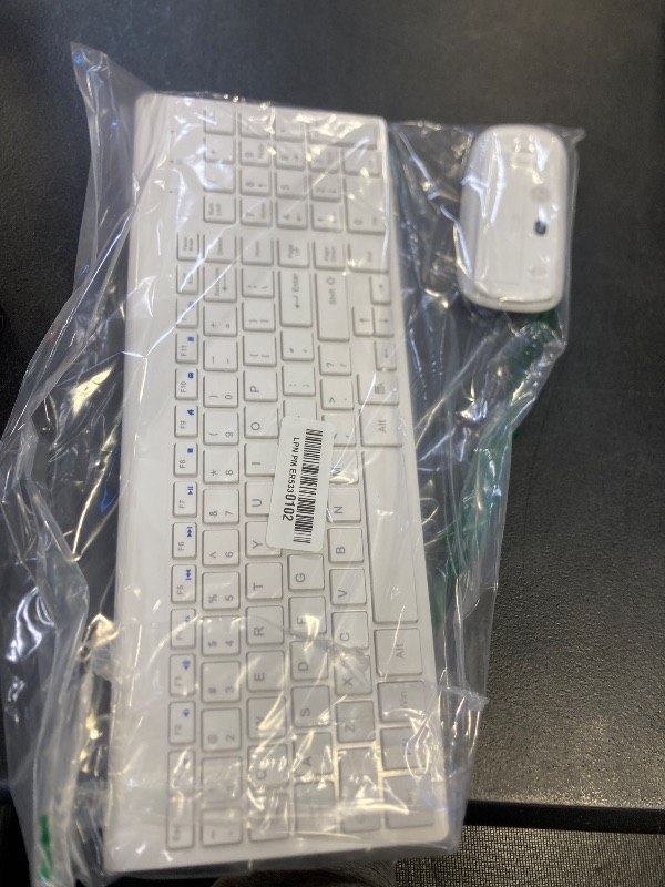 Photo 1 of Wireless Keyboard and Mouse Ultra Slim Combo, TopMate 2.4G Silent Compact USB 2400DPI Mouse and Scissor Switch Keyboard Set with Cover, Batteries Included, for PC/Laptop/Windows/Mac - White